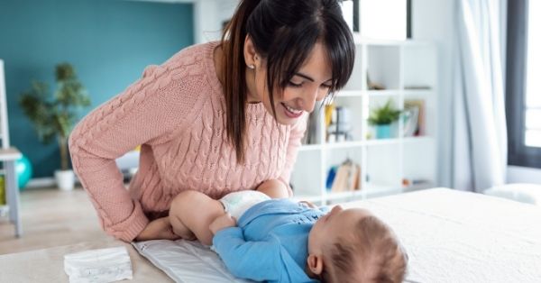 toddler clenching legs together during diaper change