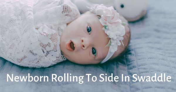 newborn rolling to side in swaddle