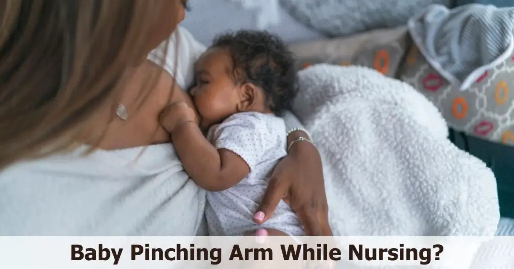 Baby Pinching Arm While Nursing